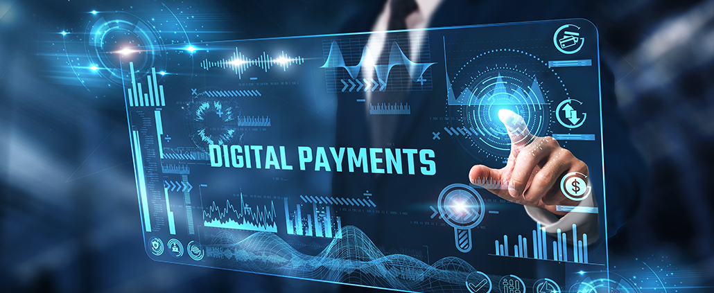 Ein Mann tippt auf einen virtuellen Bildschirm. Es erscheint das Wort "Digital Payments".